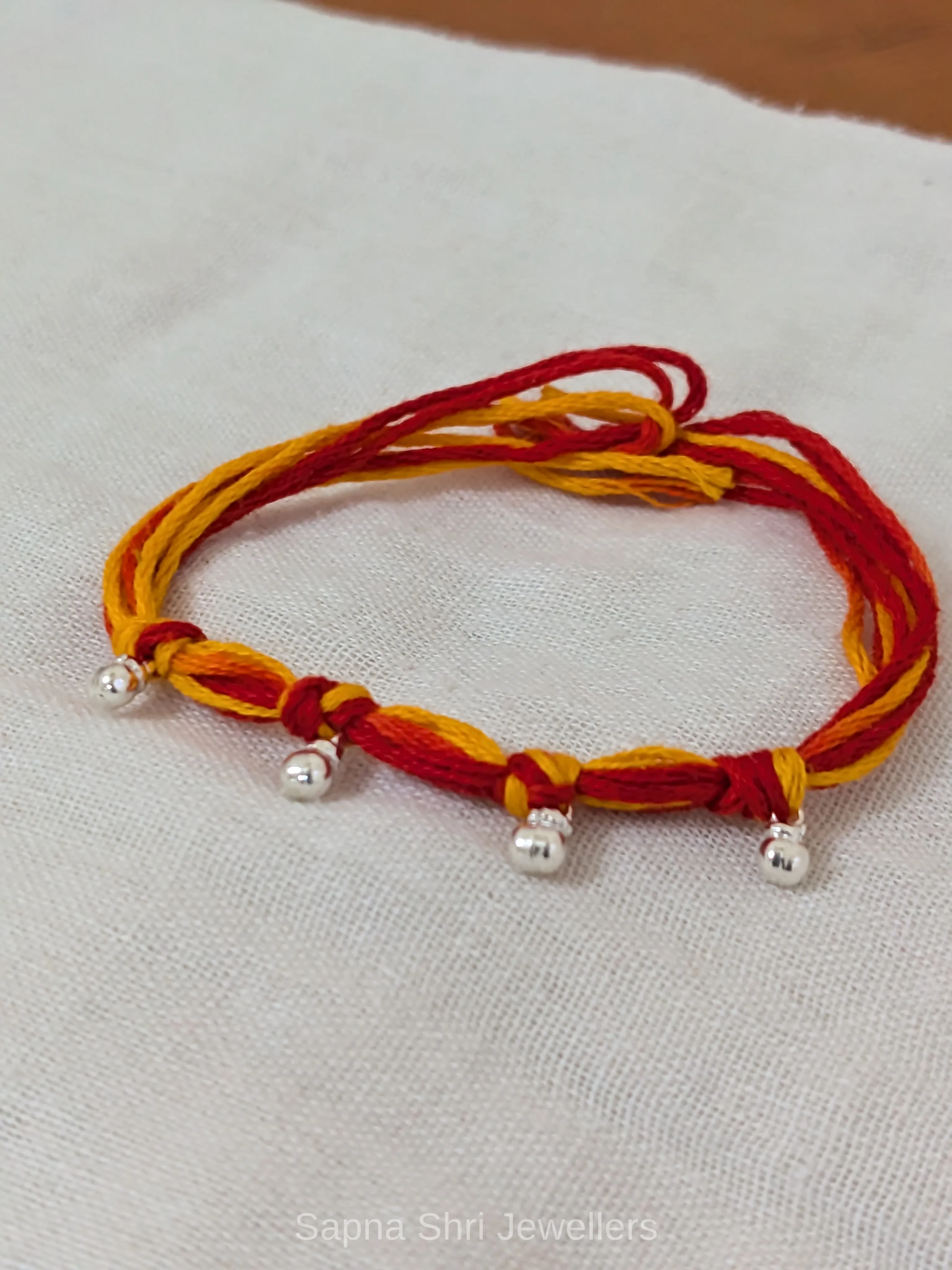 925 Silver Mauli Rakhi with Silver Beads - Image 1 of 4 925 Silver Mauli Rakhi with Silver Beads - View 1