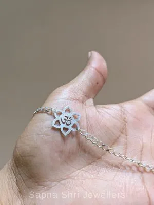 Om Lotus 925 Sterling Silver Rakhi - Sapna Shri Jewellers