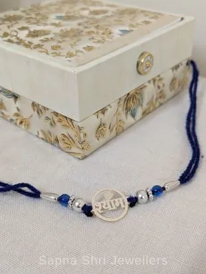 Shyam Silver Rakhi with Blue Beads & Traditional Thread - Sapna Shri Jewellers