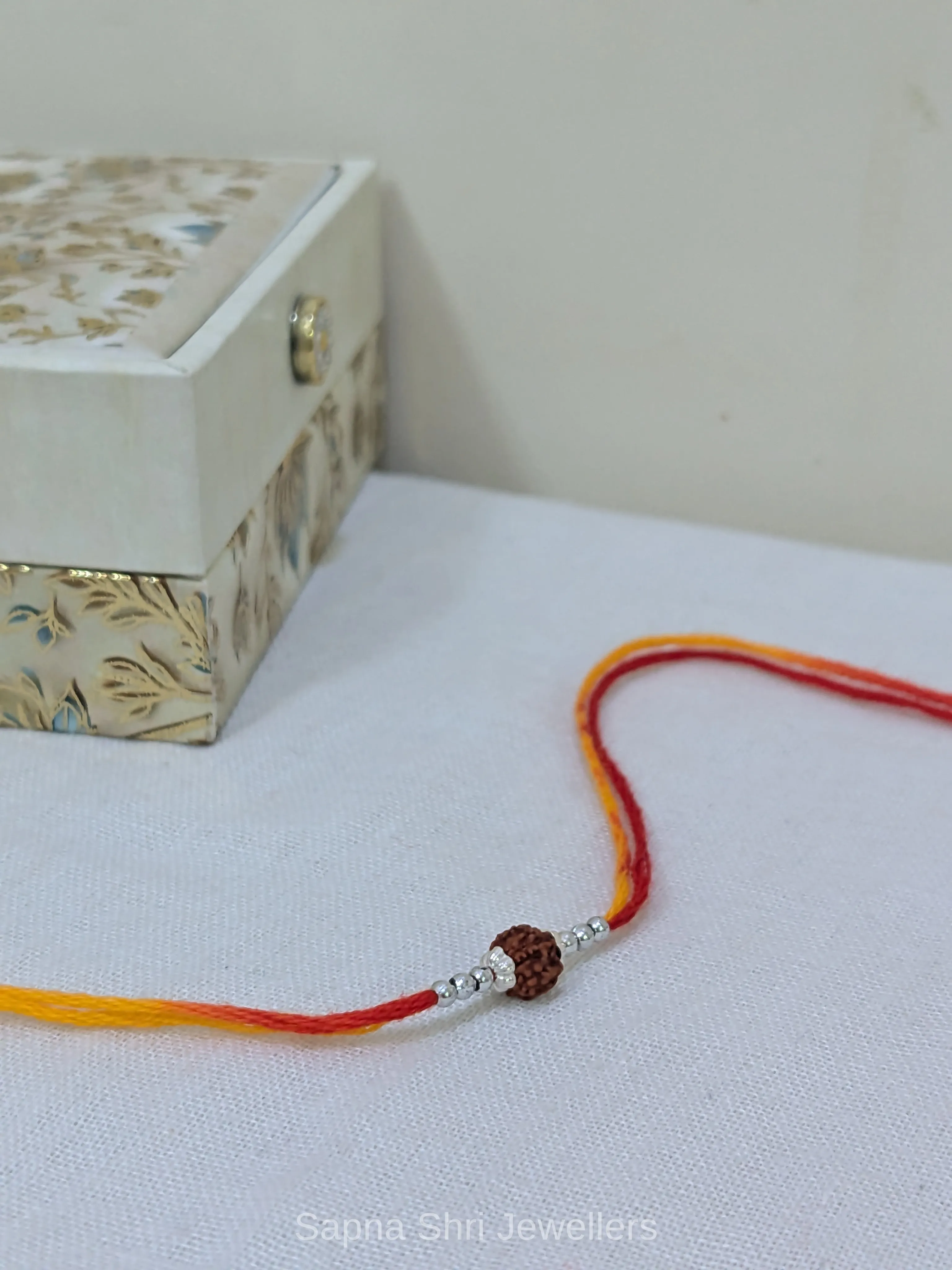 925 Silver Rudraksha Rakhi with Silver Beads & Traditional Thread thumbnail 2