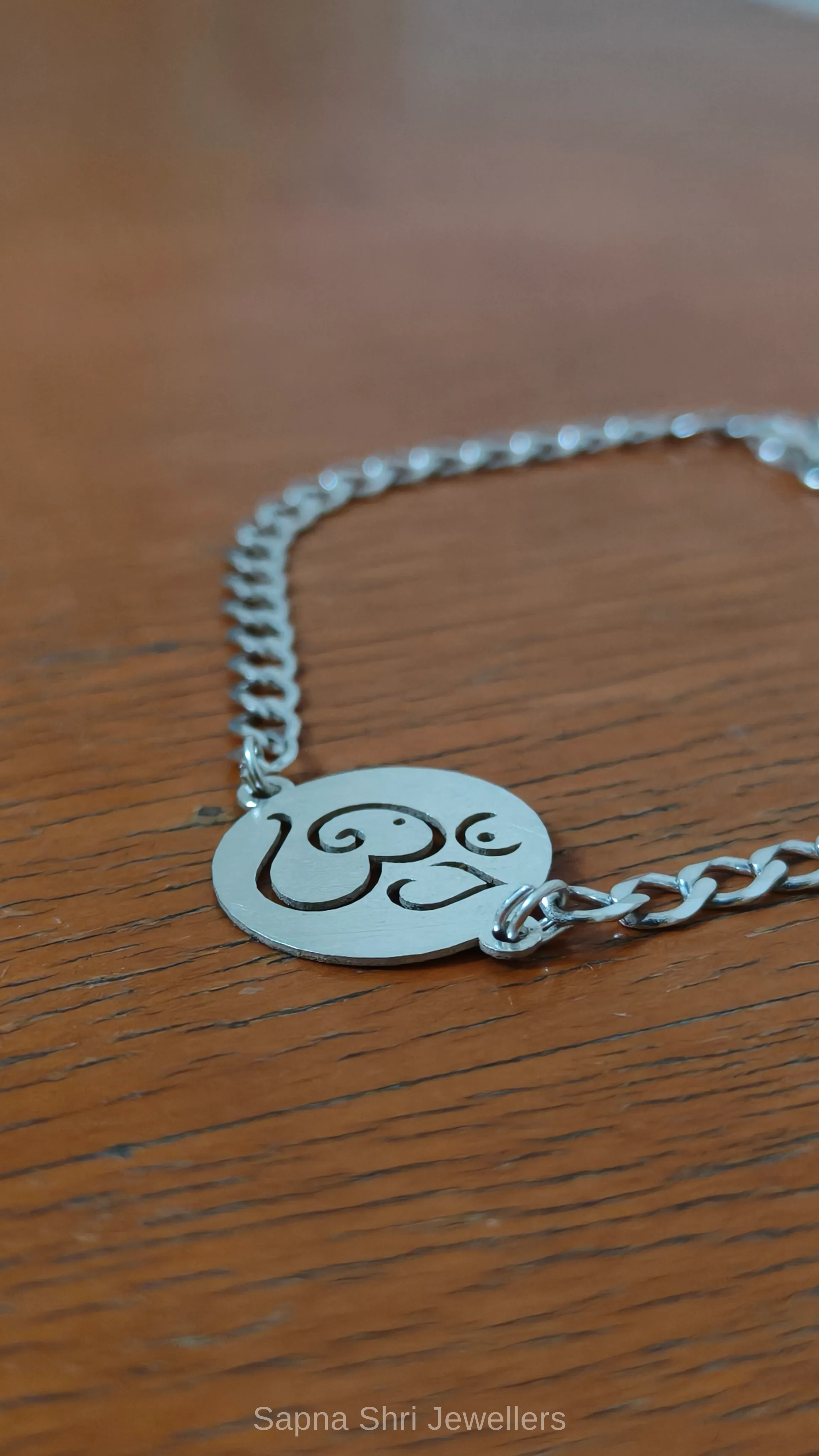Om Spiritual Silver Rakhi Bracelet thumbnail 4
