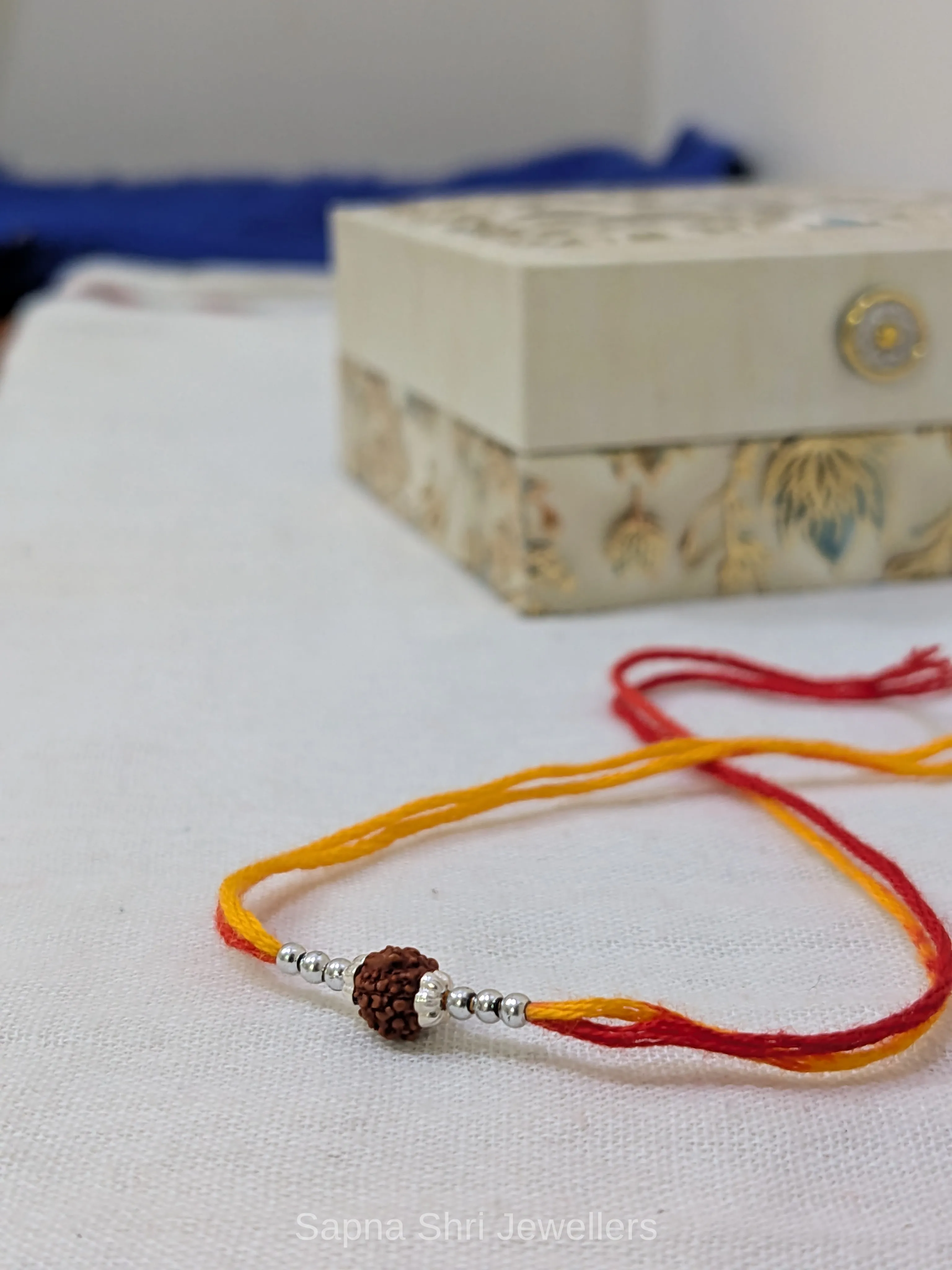 925 Silver Rudraksha Rakhi with Silver Beads & Traditional Thread thumbnail 4