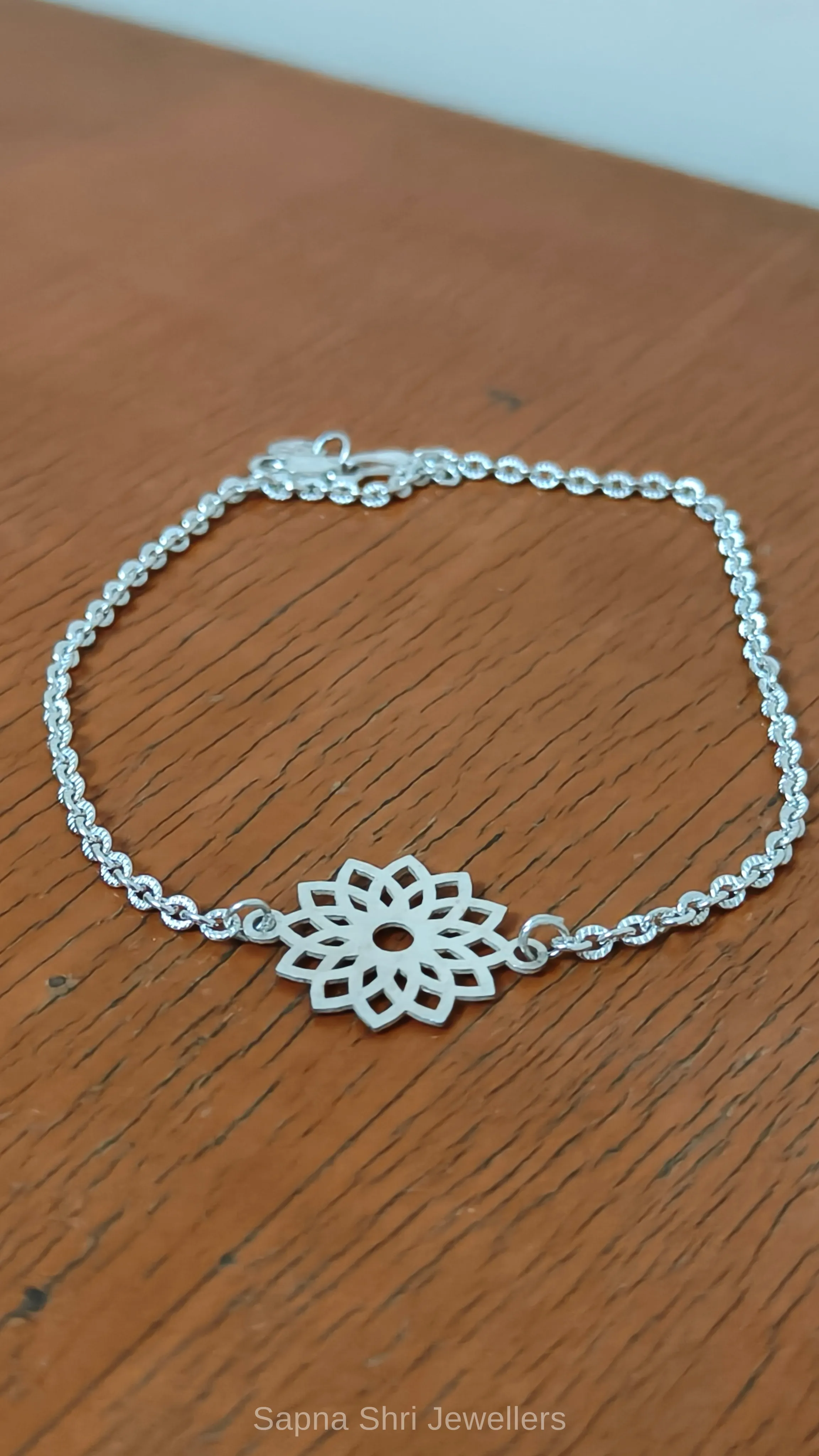 Lotus Design Silver Rakhi Bracelet thumbnail 2