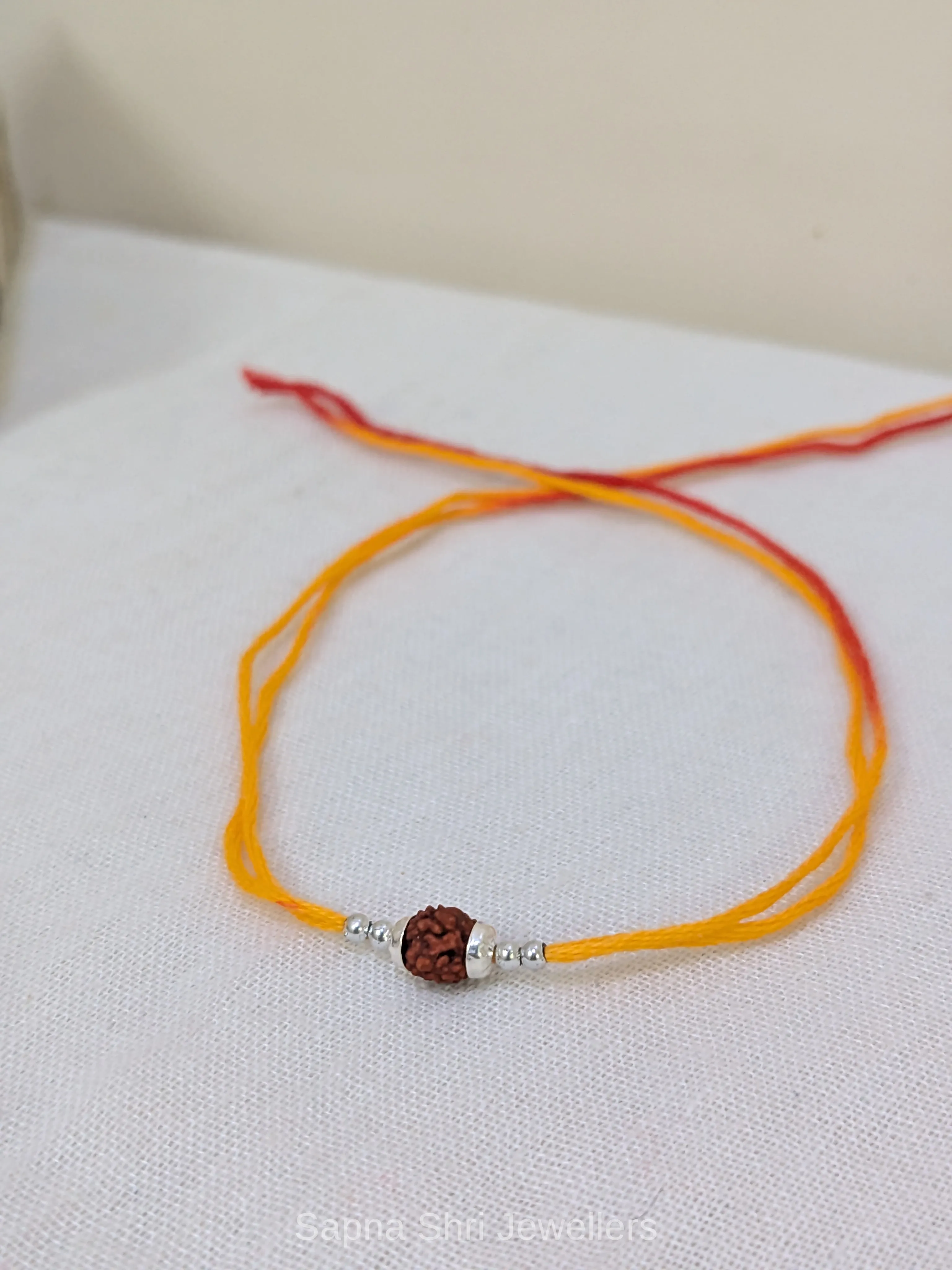 925 Silver Minimal Rudraksha Rakhi with Silver Beads & Mauli Thread thumbnail 3