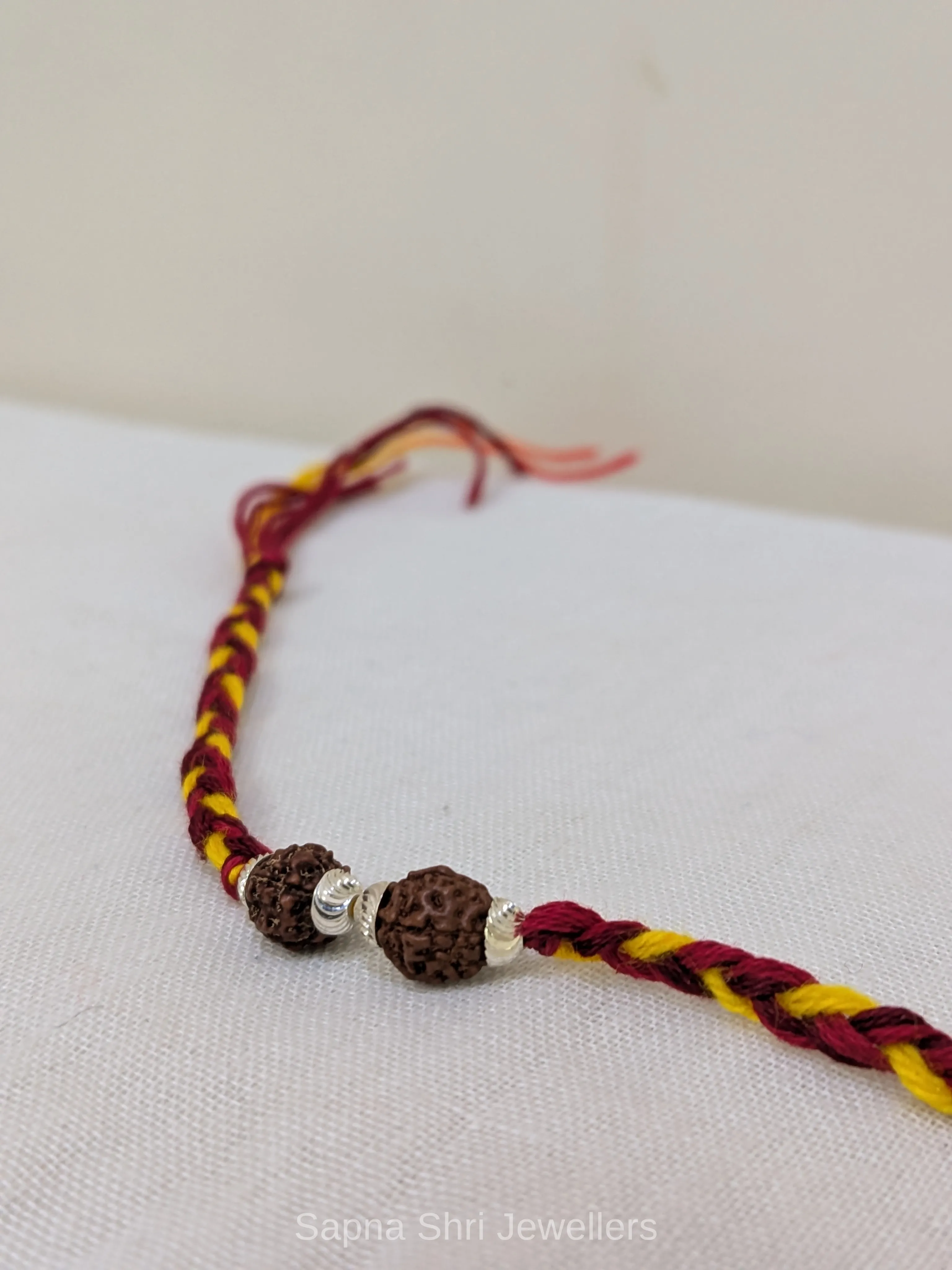 925 Silver Twin Rudraksha Rakhi with Minimal Silver Beads thumbnail 2