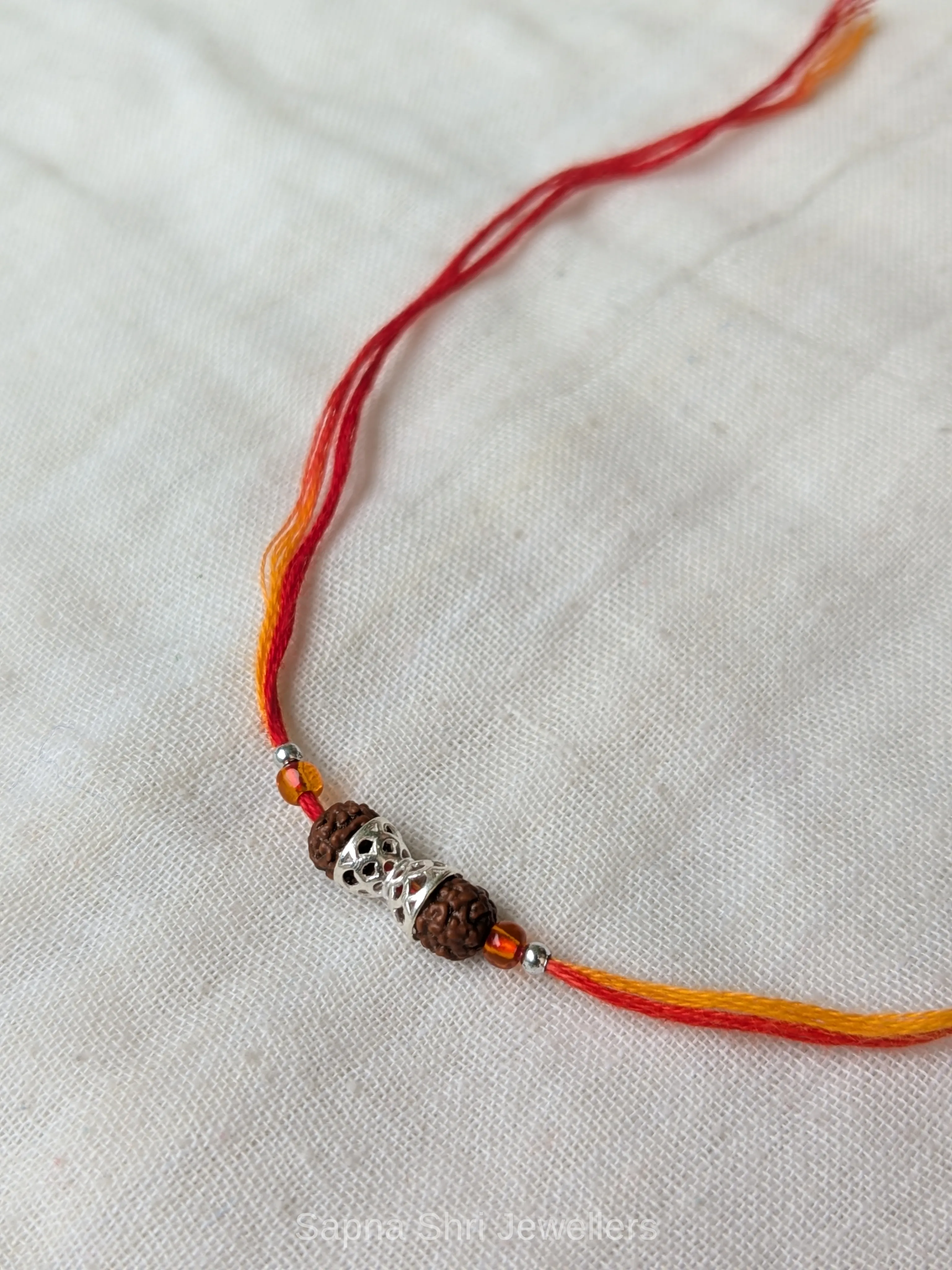 925 Silver Rudraksha Cap Rakhi with Elegant Silver Detailing thumbnail 4