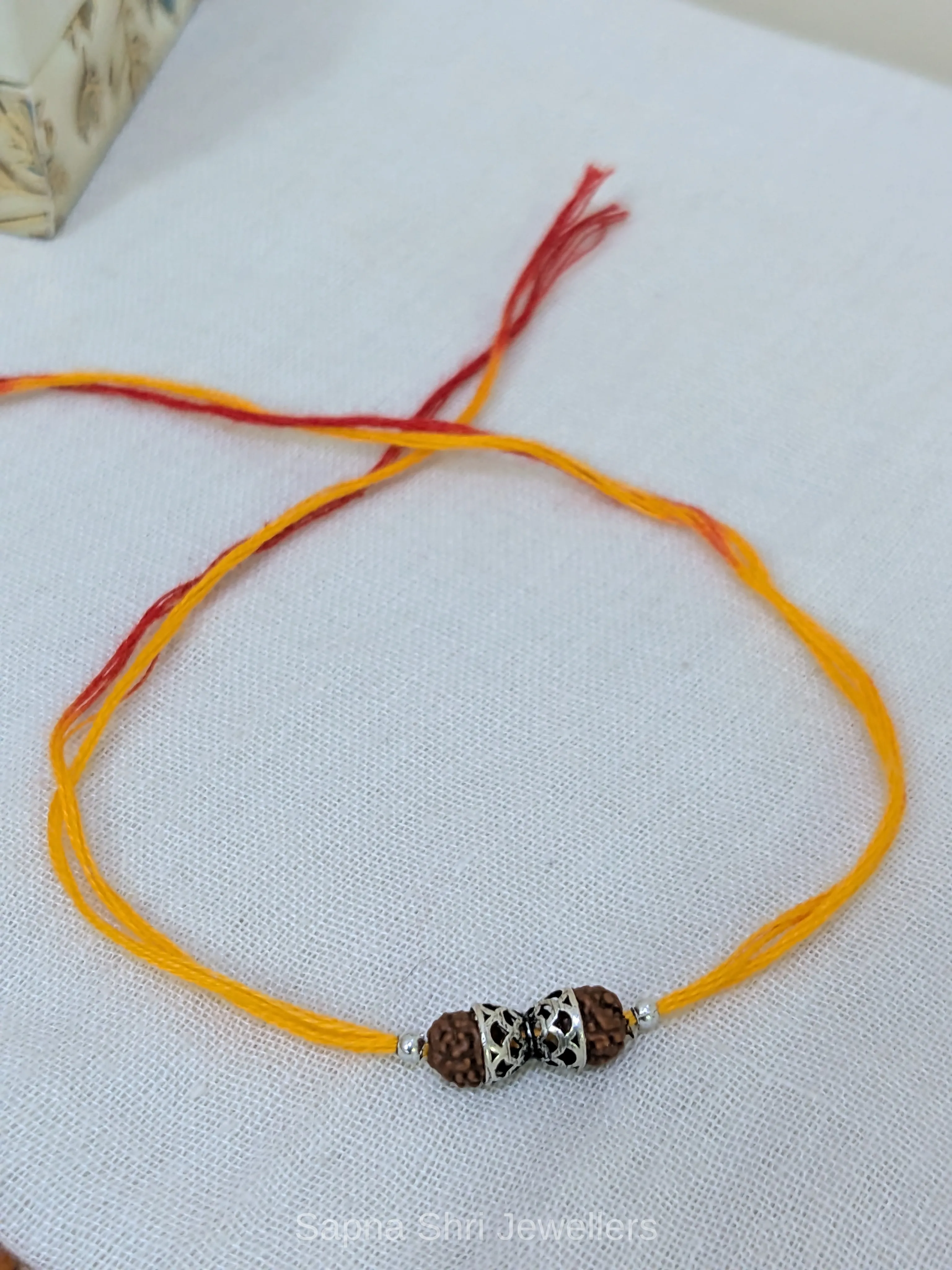 925 Silver Rudraksha Rakhi with Designer Silver Caps & Mauli Thread thumbnail 4