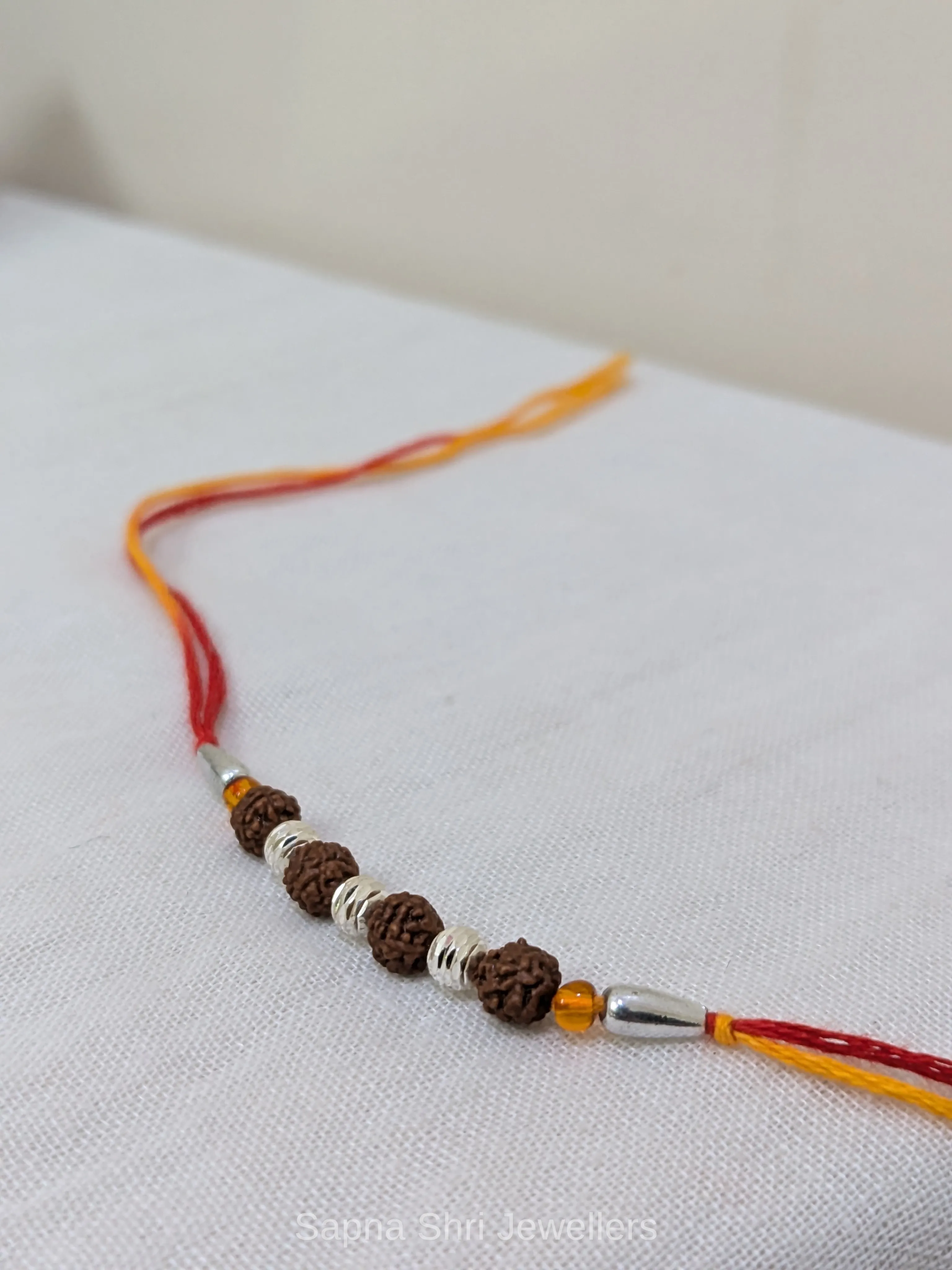 925 Silver Rudraksha Beads Rakhi with Traditional Mauli Thread thumbnail 2