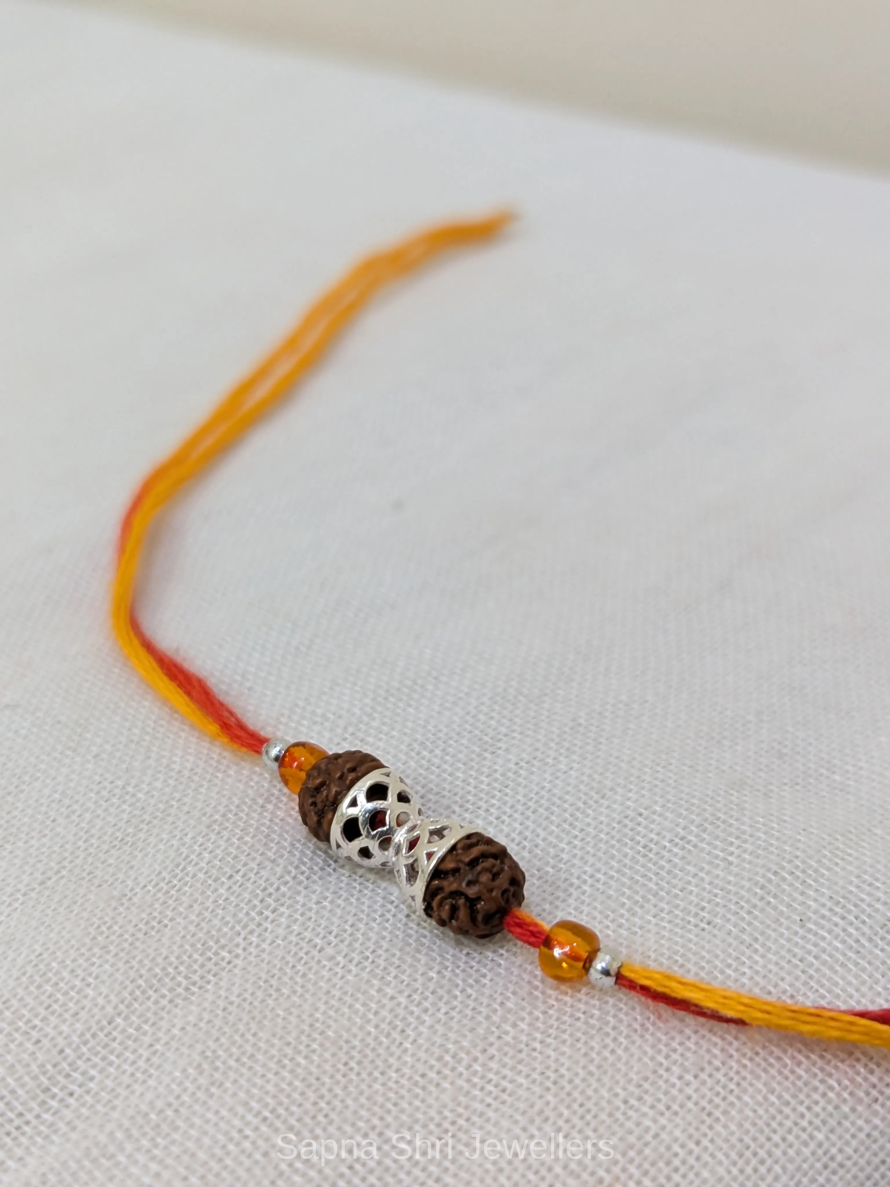 925 Silver Rudraksha Cap Rakhi with Elegant Silver Detailing thumbnail 2