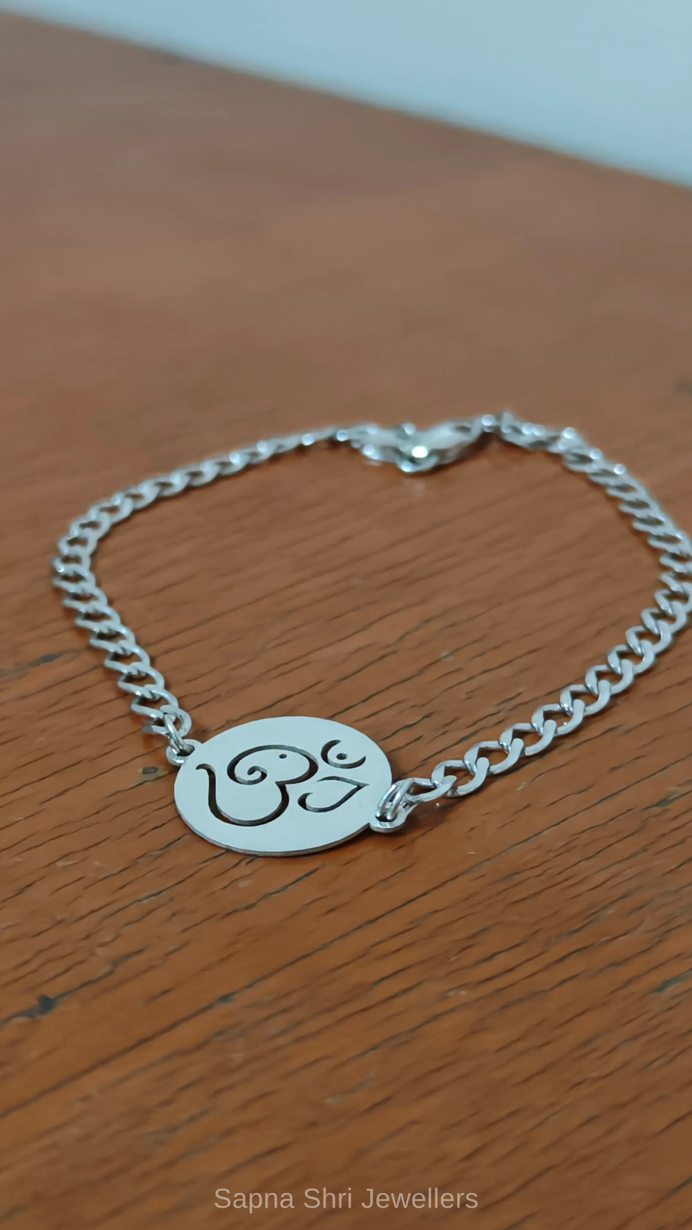 Om Spiritual Silver Rakhi Bracelet thumbnail 2