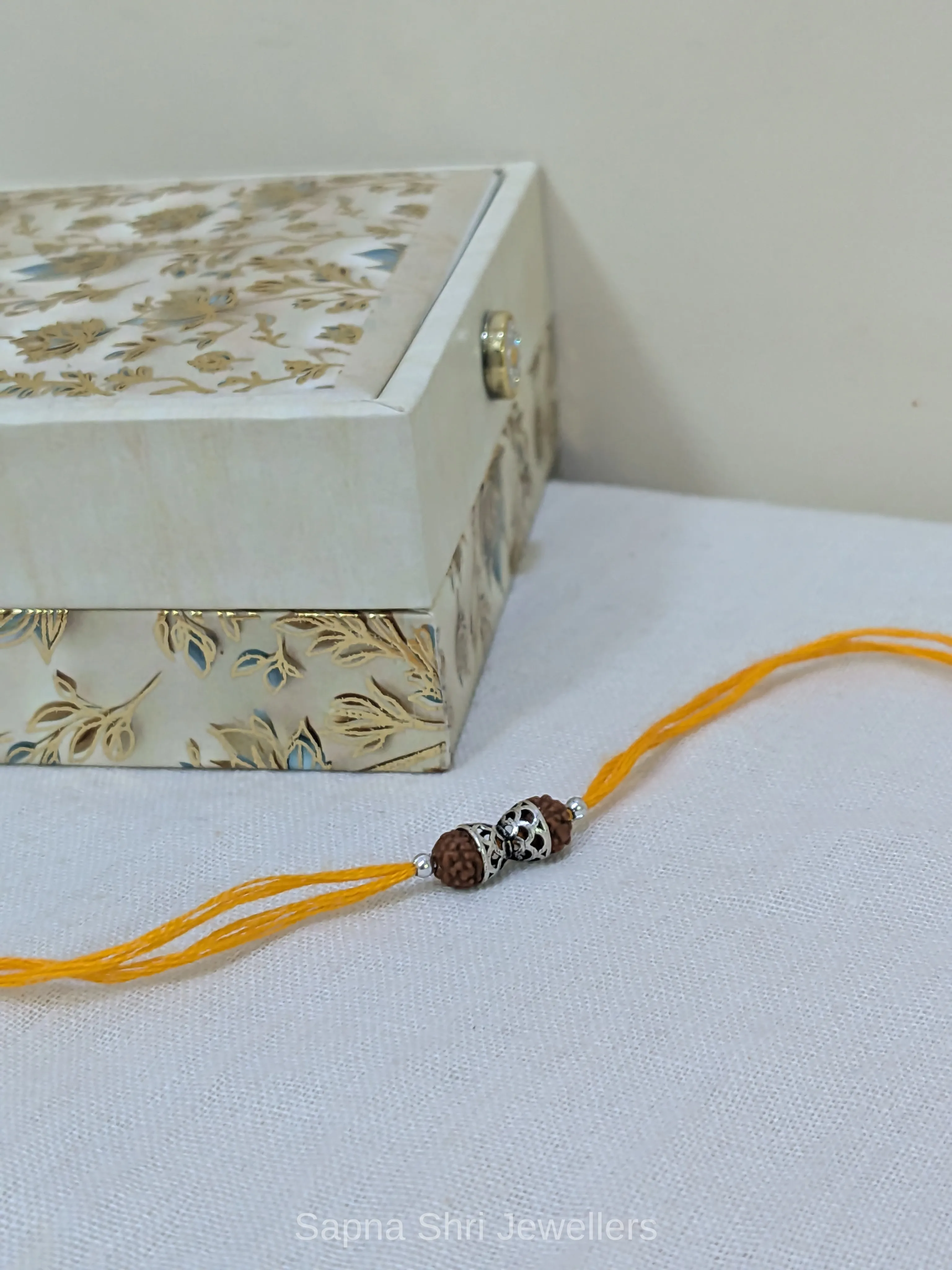 925 Silver Rudraksha Rakhi with Designer Silver Caps & Mauli Thread thumbnail 3