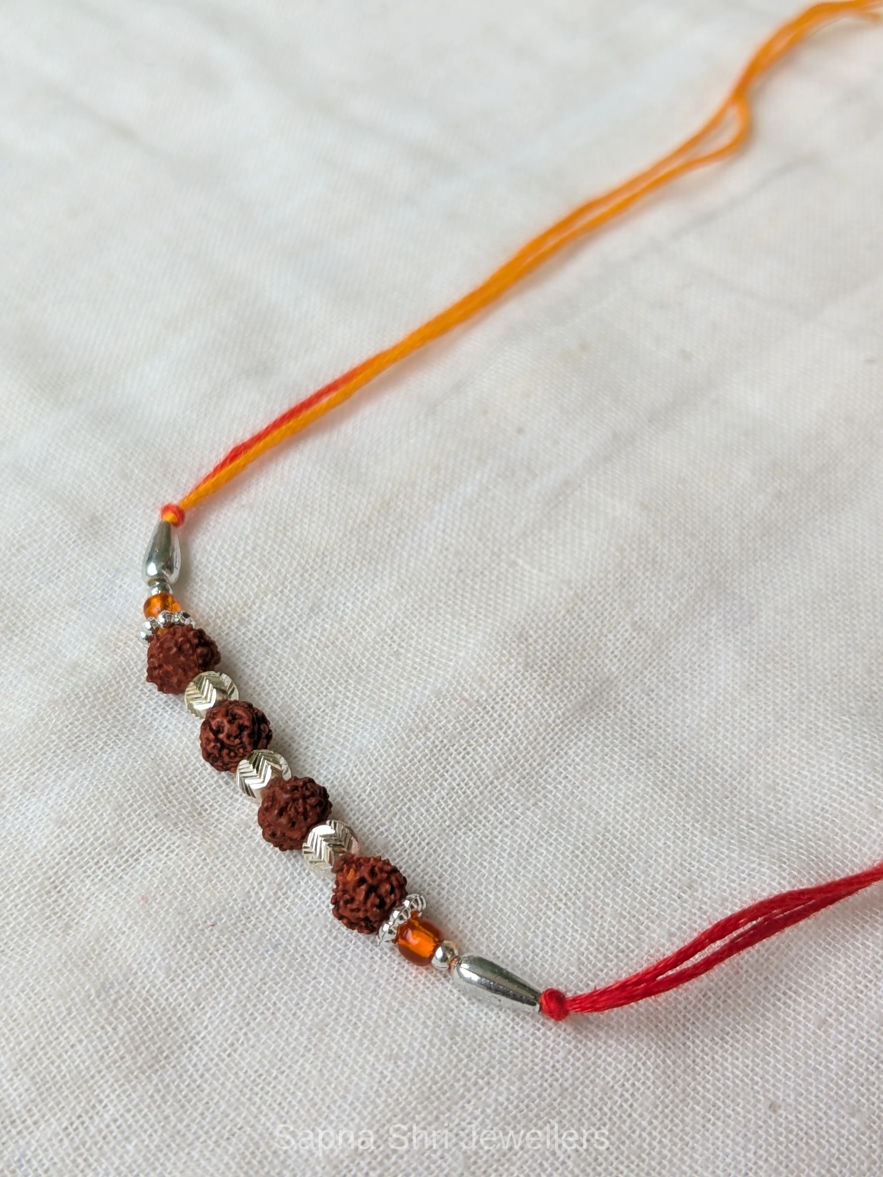 925 Silver Five Rudraksha Rakhi with Silver Beads & Traditional Thread thumbnail 4