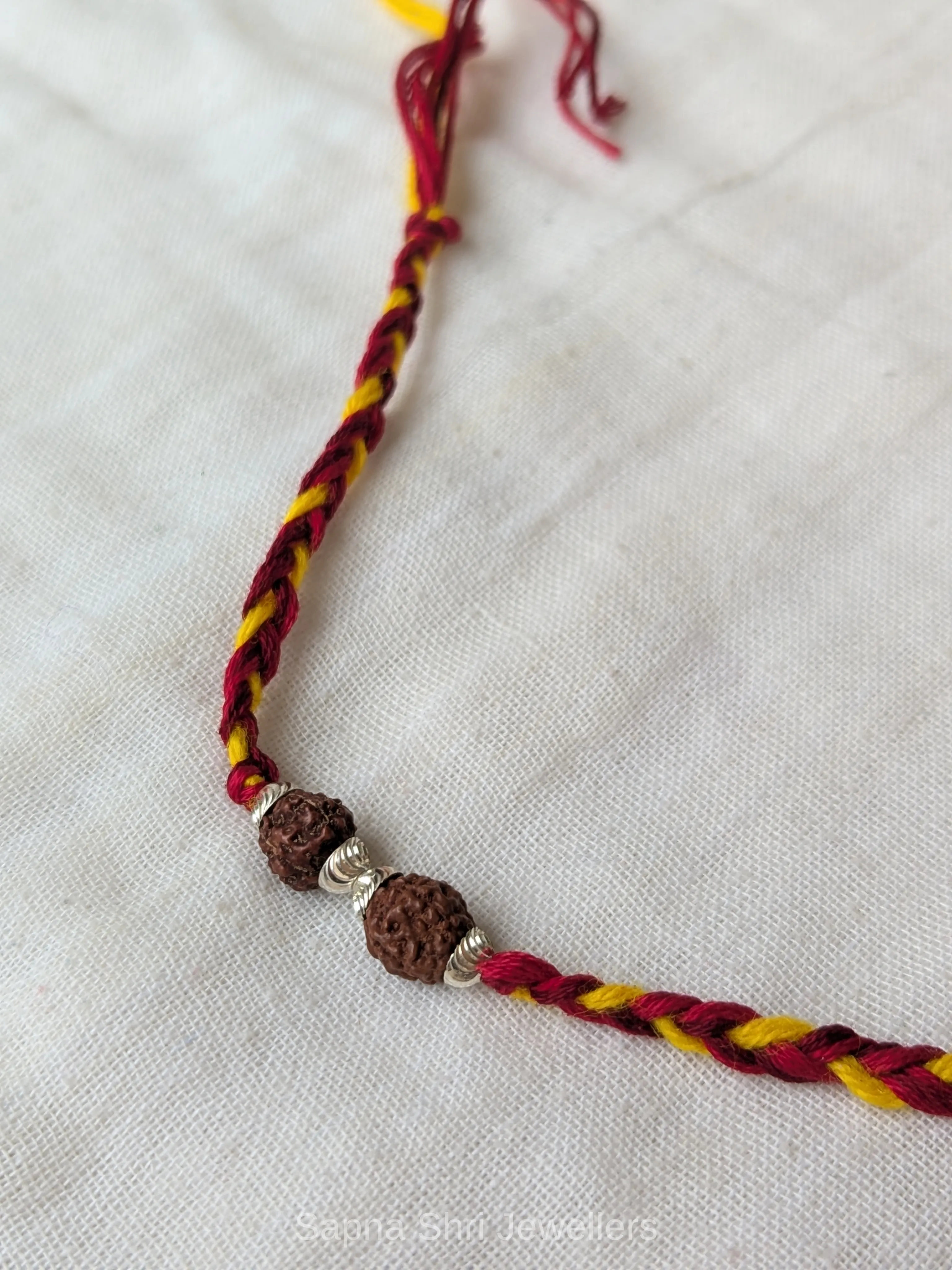 925 Silver Twin Rudraksha Rakhi with Minimal Silver Beads thumbnail 4