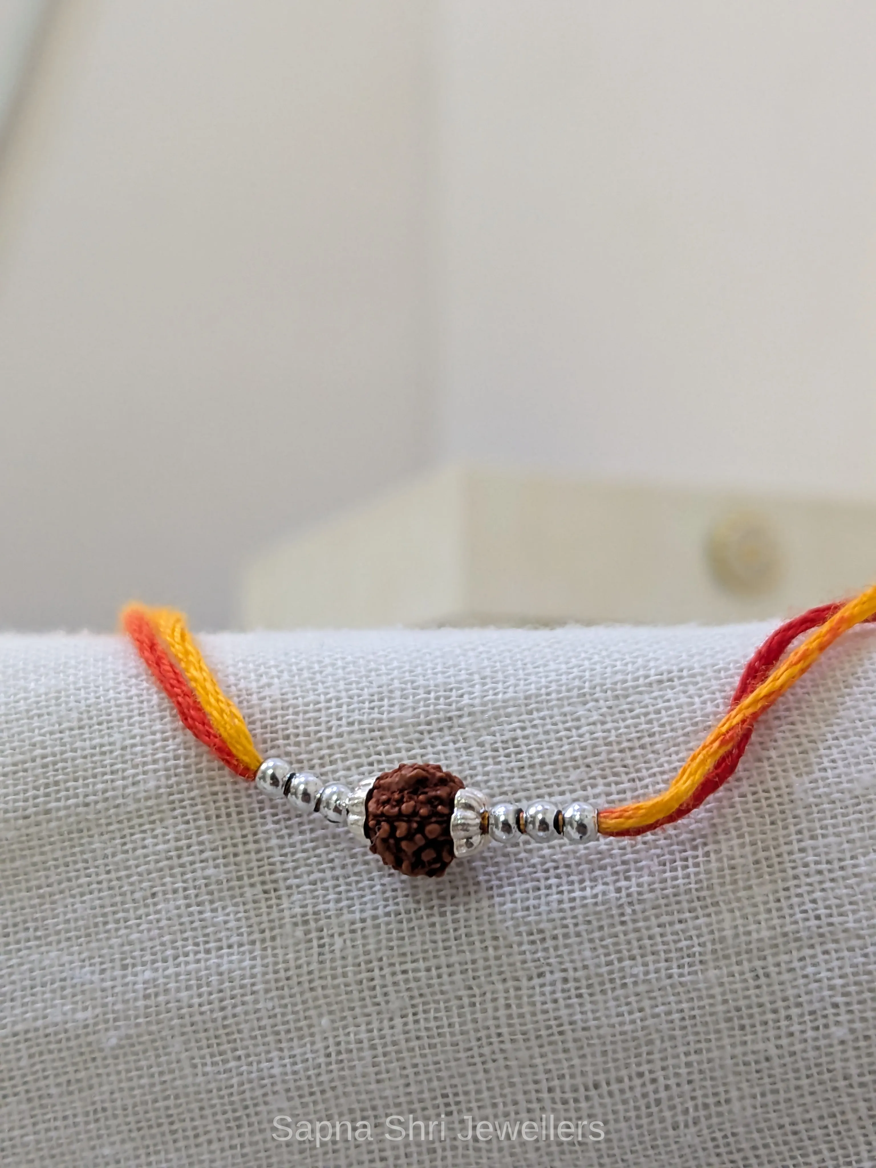925 Silver Rudraksha Rakhi with Silver Beads & Traditional Thread thumbnail 3
