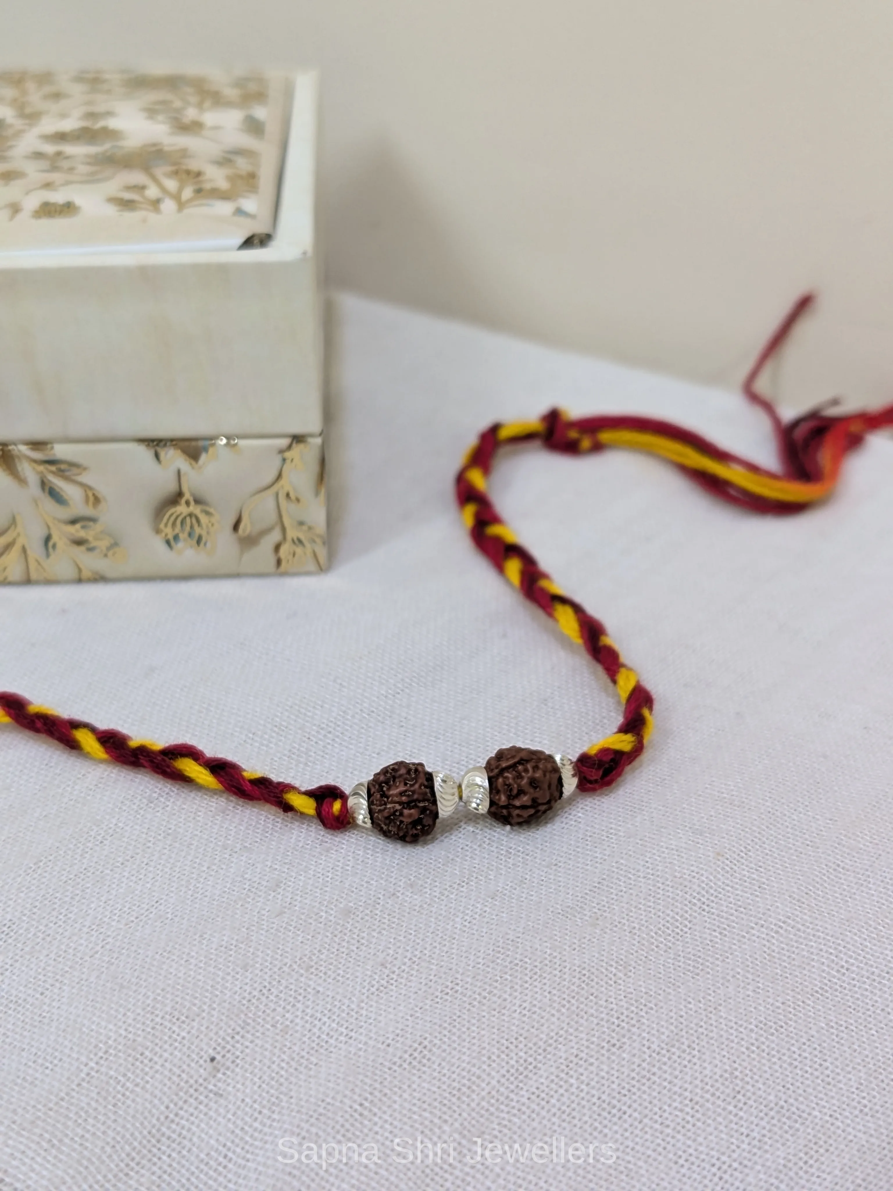 925 Silver Twin Rudraksha Rakhi with Minimal Silver Beads thumbnail 3