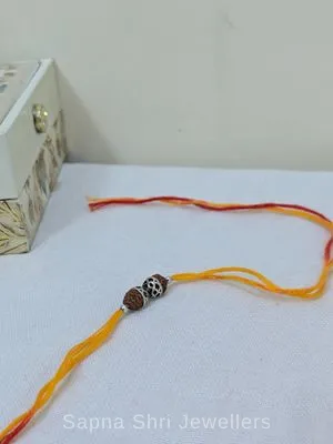 925 Silver Rudraksha Rakhi with Designer Silver Caps & Mauli Thread