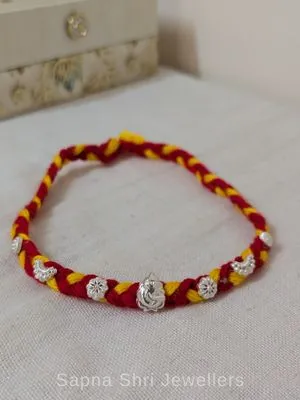 Ganesh Floral Silver Rakhi – Traditional Red Yellow Silver Rakhi
