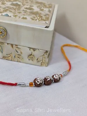 925 Silver Om Swastik Trishul Rudraksha Rakhi with Red & Yellow Mauli